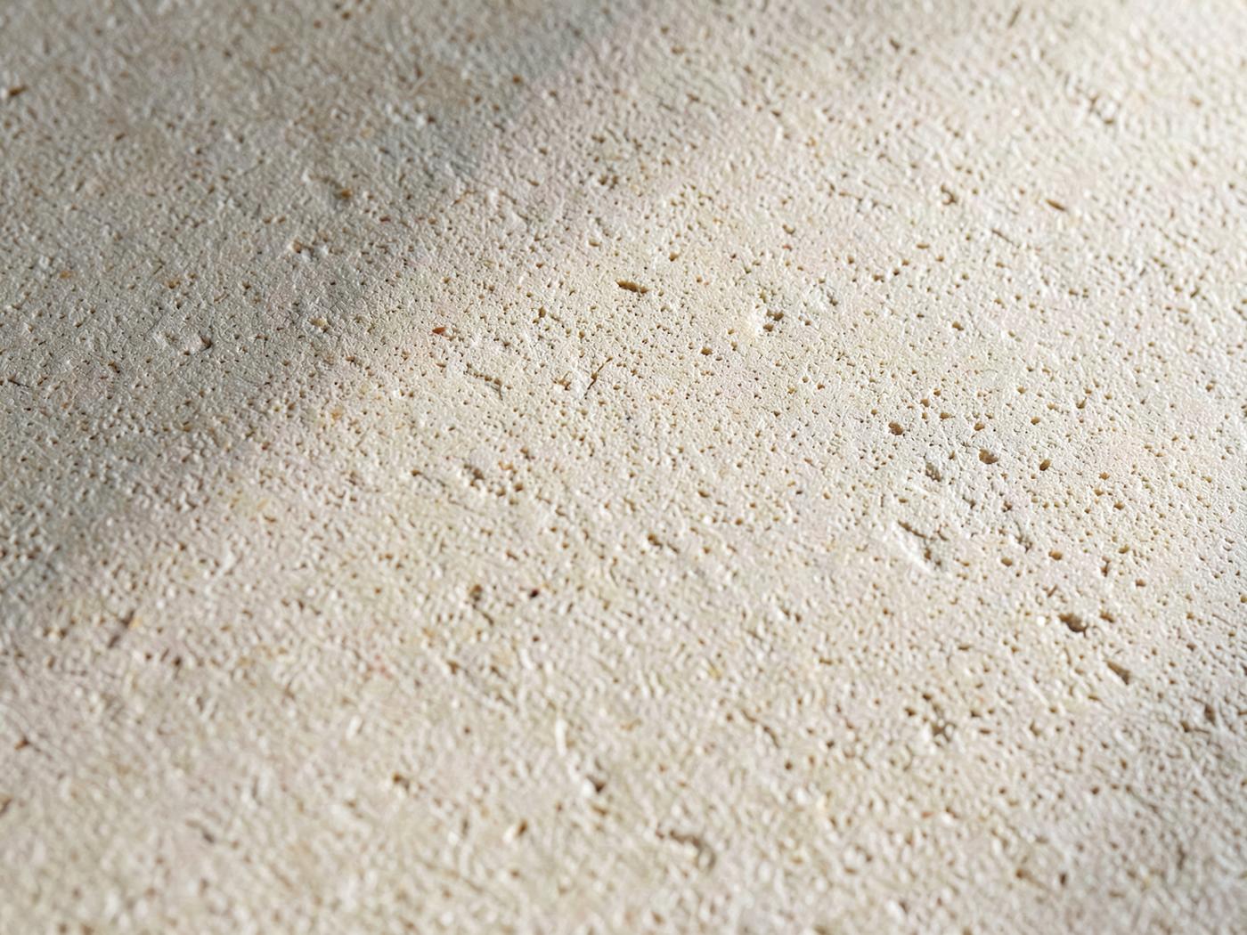 Sandblasted natural-stone surface detail